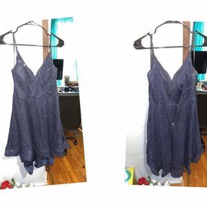 I can't fit it anymore it is lovely only wore once. it's a size 12 and navy blue